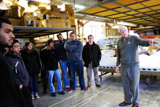 Neoteric hovercraft president talking to students